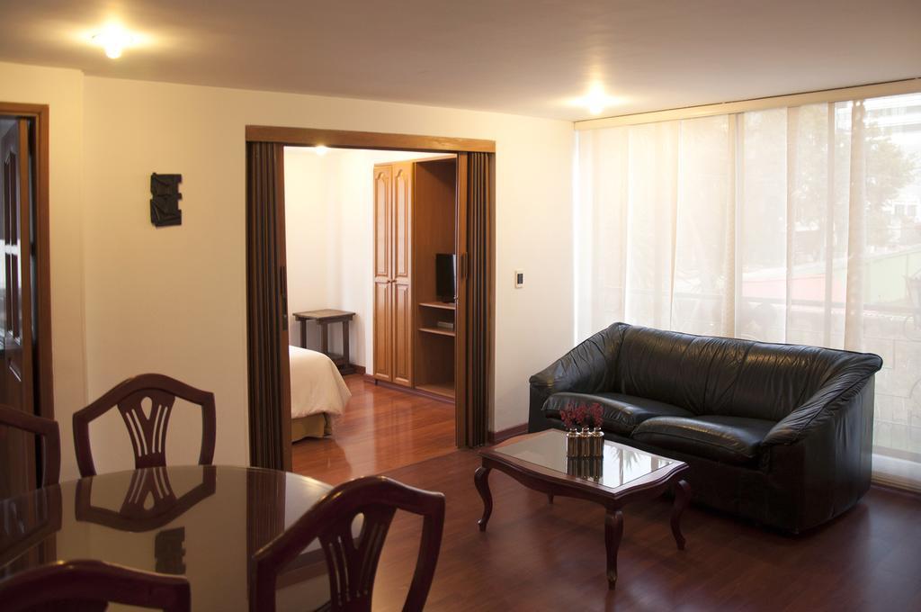 Apartaestudios Los Andes Богота Номер фото