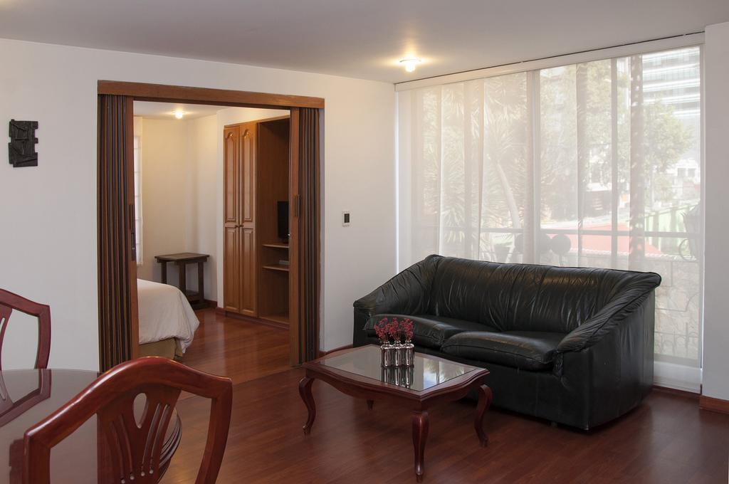 Apartaestudios Los Andes Богота Номер фото